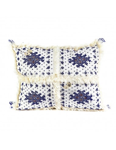 Coussin vintage berbre rectangulaire en laine vierge tiss main motifs bleus avec ses pompoms de laine assortis